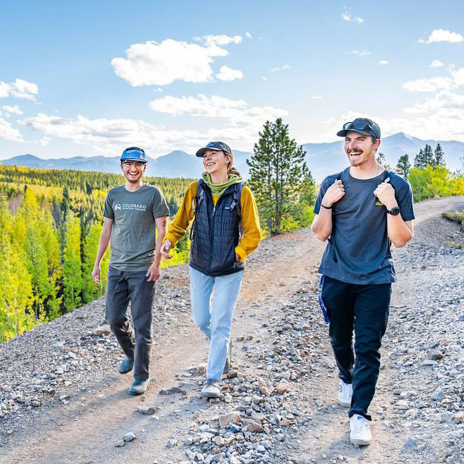 Students hiking on a dirt road