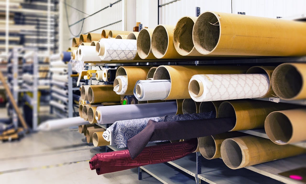 Rolls of fabrics on shelves
